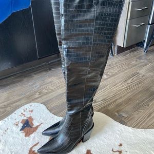 Thigh high black cowboy boots